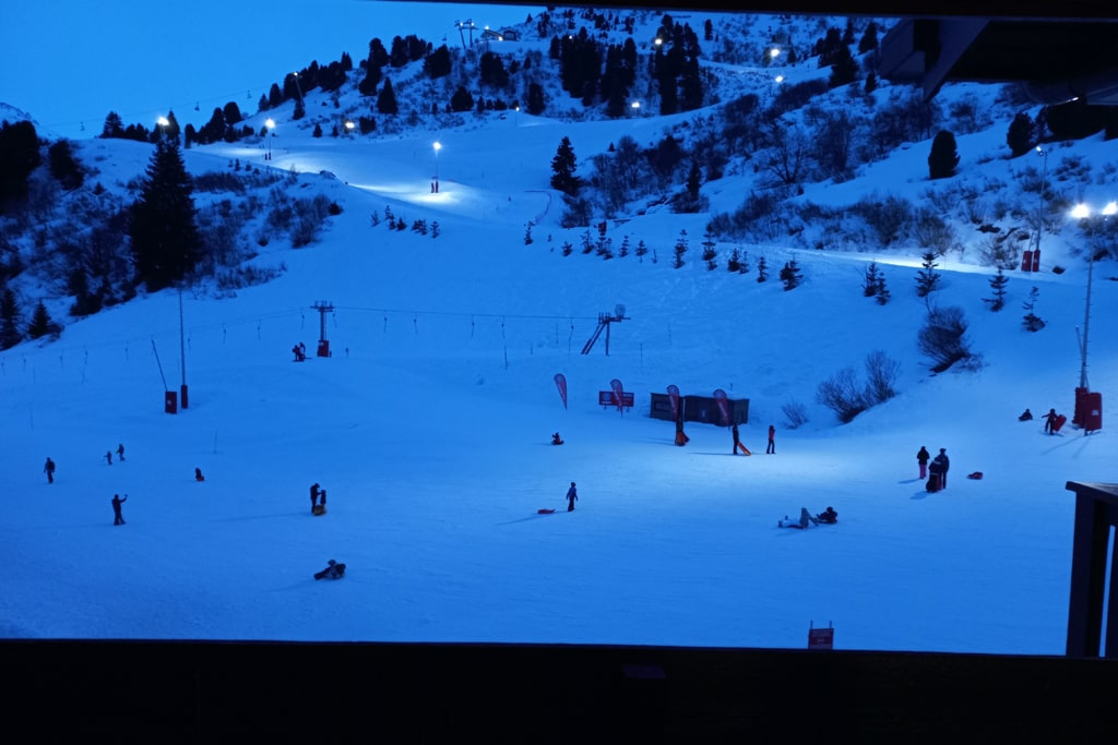 Evening on the slopes of Méribel-Mottaret, seen from a balcony
